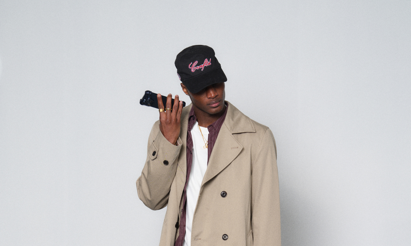 Man styling a baseball cap for spring
