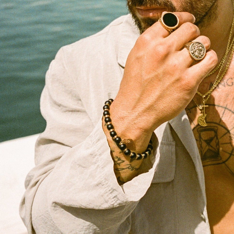 Geteiltes Perlenarmband (Gold)