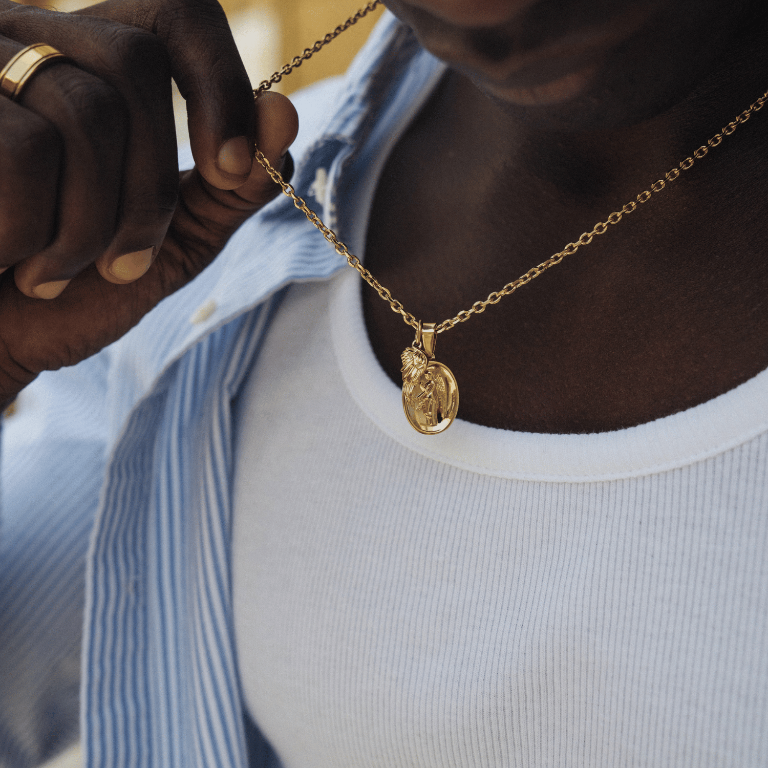 Nike Pendant (Gold)