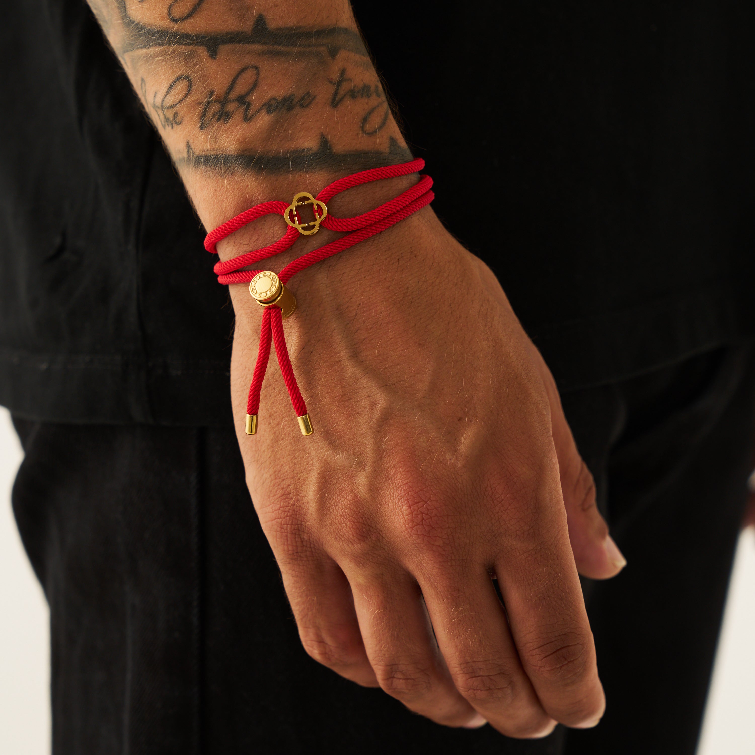 Red string bracelet sales with gold charm