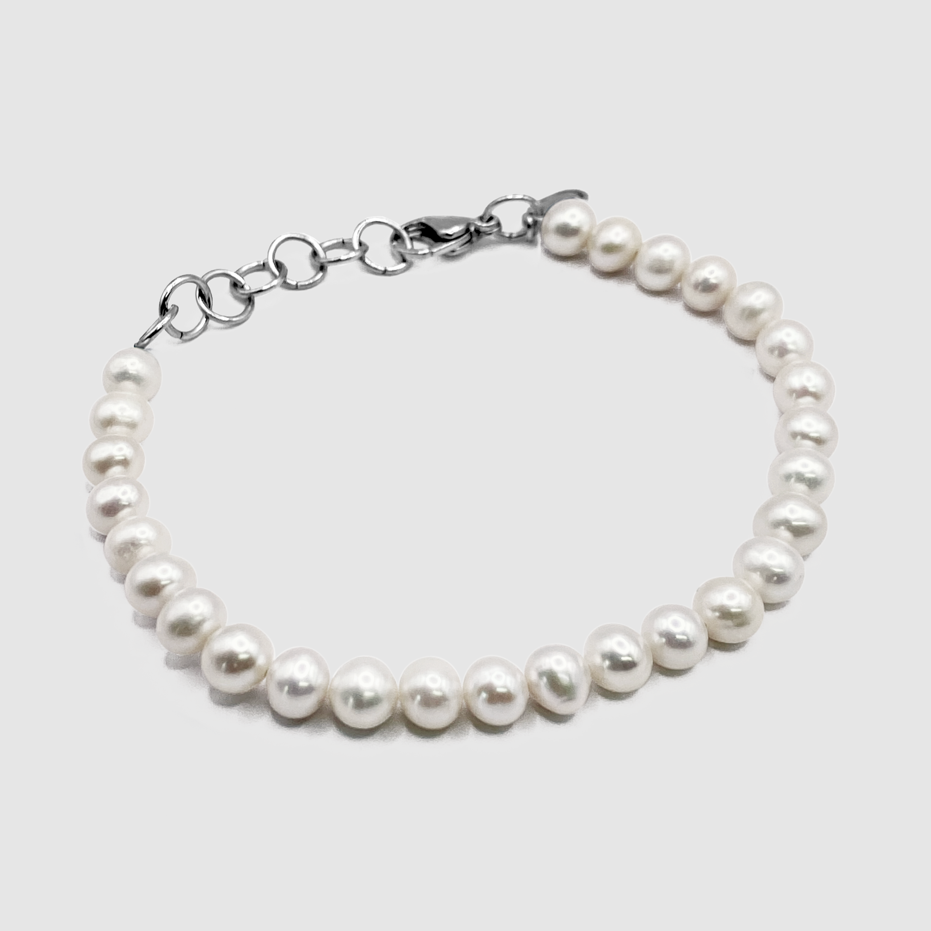 Bracelet arrondi en perles véritables (argent)